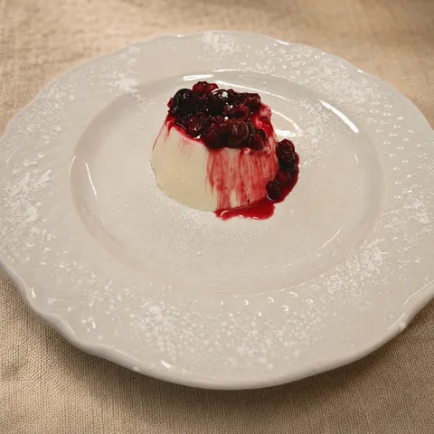House-made panna cotta with wild berries.